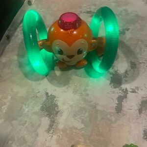 Orange and Green Light-Up Monkey Toy